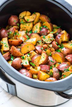 the food is cooked and ready to be eaten in the crock pot on the table