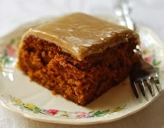 a piece of cake on a plate with a fork