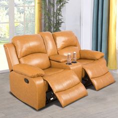 two recliners sitting next to each other in a living room