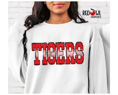 Personalized Tiger School Spirit T-Shirt Crewneck, Hoodie Hooded Sweatshirt Football, Baseball, Basketball, Softball, Track, Volleyball, Cross Country, Cheer, Wrestling Not all colors are available in all sizes and styles.  Please check the color and size charts in photos. We do our best to accurately represent shirt colors by using actual photos but do understand that all monitors will display differently. Please contact us prior to purchase with any questions on sizing or colors. Your purchase includes a custom imprint created specifically for your team! A product proof will be emailed to you within 1 business day.  Please keep an eye on your Etsy messages and reply with any changes within 24 hours. Your order will be sent to production after that time if no response is received. Excessi Cheer Football, Represent Shirt, Tiger Shirt, Tiger T Shirt, School Spirit, Cross Country, Size Charts, Sweatshirt Hoodie, Mom Dad