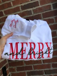 Sweatshirts are unisex sizing. Relaxed fit, true to size. If you want an oversized look, go two sizes up from your normal size. 'Tis the season to feel merry and bright and spread the holiday cheer! Custom embroidery on the sleeves will also make this the perfect gift! Features: 8-ounce, 50/50 cotton/poly Double-needle stitching at waistband and cuffs 1x1 rib knit collar, cuffs and waistband with spandex Please note that all embroidered items come with a backing to support the stitches. Christmas Embroidery Gifts, Cute Christmas Sweatshirts, Christmas Embroidery Sweatshirts, Embroidered Christmas Sweatshirt, Christmas Cricut Shirts, Vinyl Christmas Gifts, Christmas Sweatshirts Vinyl, Embroidered Sweatshirt Ideas, Cricut Sweatshirt Ideas