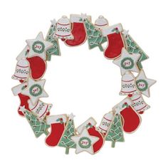 christmas cookies arranged in the shape of a wreath with stockings and stocking on them