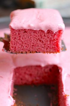 a close up of a piece of cake on a fork