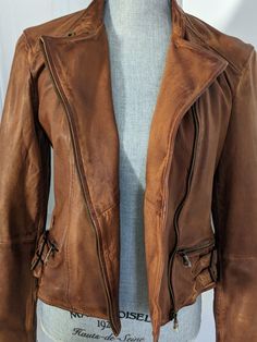 Ralph Lauren Women's Lamb Leather Jacket Top Grain  Mahogany Brown Color Women's Size 2 See photos for measurements New with Tags See my other listings for similar styles and name brands.  Please email me with any questions.  All my items come from a clean, smoke-free home.  Thanks for looking! Ralph Lauren Fall Outerwear, Vintage Ralph Lauren Outerwear, Distressed Brown Long Sleeve Outerwear For Fall, Ralph Lauren Casual Brown Outerwear, Casual Ralph Lauren Brown Outerwear, Casual Brown Ralph Lauren Outerwear, Fitted Ralph Lauren Fall Outerwear, Brown Biker Jacket For Fall, Lamb Leather Jacket