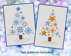 two cross - stitch christmas trees with snowflakes on them