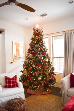 a decorated christmas tree in a living room