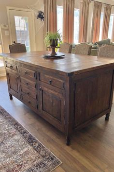 Custom Jordyn Reclaimed Wood Kitchen Island in Medium Walnut stain designed from our JordynBathroom Vanity. Contact us to customize for your space! Kitchen Cabinet Wood Colors, Barnwood Vanity, Walnut Kitchen Island, Island Drawers, Reclaimed Wood Kitchen Island, Reclaimed Wood Kitchen, Colorado House, 2024 Kitchen, Walnut Kitchen