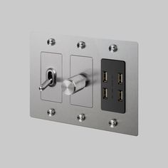 an electrical outlet with multiple outlets and two plugs on each side, in stainless steel