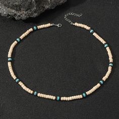 Material: Beads/Beads Fashion Element: Asymmetry Style: Retro Southwestern Style Large Beads For Beach, Southwestern Style Large Beads, Southwestern Style Large Beach Beads, Southwestern Turquoise Beaded Necklaces For Beach, Turquoise Southwestern Beaded Necklace For Beach, Beaded Turquoise Necklace With Round Beads For The Beach, Turquoise Beach Necklace With Round Spacer Beads, Beach Turquoise Heishi Beads Necklace, Turquoise Jewelry With Wooden Beads For The Beach