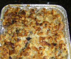 a casserole dish sitting on top of a stove