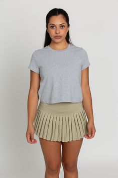 This Classic Short Sleeve is the essential tee that every woman needs. This tee has a simple cut that is semi fitted, making it both flattering and comfortable. It features capped sleeves, a round neckline and is the ultimate staple top. Sporty Scoop Neck T-shirt For Everyday, Fitted Cropped T-shirt For Everyday Casual Wear, Casual Fitted Cropped T-shirt For Everyday, Basic Everyday Cap Sleeve Tops, Basic Cap Sleeve Tops For Everyday, Athleisure Crew Neck Muscle Tee, Basic Stretch Muscle Tee, Casual Stretch Muscle Tee With Short Sleeves, Casual Gray Short Sleeve Top