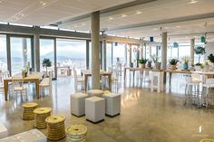 a large open room with tables and chairs