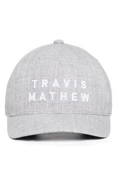 a gray hat with the words travis's mathew written on it in white