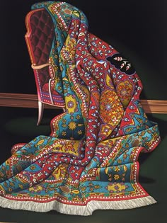 a painting of a chair with a colorful blanket draped over it's head and back