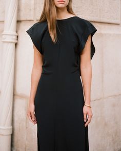 An elegant floor-grazing maxi dress, designed from luxurious silk crepe. Short cap sleeves lead into a drape detail down the back of the dress, which is open and backless. There is delicate tie detailing, adjustable for a custom fit. Semi-fitted through the waist and hips, it then falls into a soft A-line skirt. Wear with an elevated heel for evening affairs and special occasions. Black Tie Dress, Maxi Dress Sale, Maxi Dress Black, Women Wedding Guest Dresses, Black Maxi, Silk Crepe, Event Dresses, Blazer Dress, Black Maxi Dress