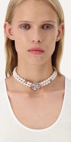 Introducing the Betsy Choker from Justine Clenquet's new Showgirls collection. This elegant choker features a double strand of pearls and is accented with a silver-tone rose. Elevate your look with this luxurious piece. Details: Color: Silver Imitation pearls Brass dipped in palladium Spring-ring clasp Length: 12.5-15.75in / 32.0-40.0cm Designed & handmade in France Justine Clenquet, Strand Of Pearls, Elegant Choker, Pale Gold, Affordable Jewelry, Elevate Your Look, Animal Jewelry, Spring Rings, Choker