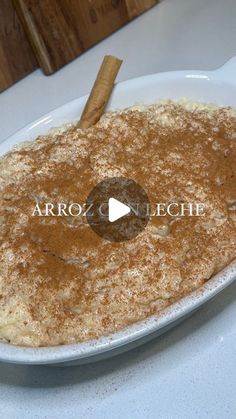 a white plate topped with food on top of a table