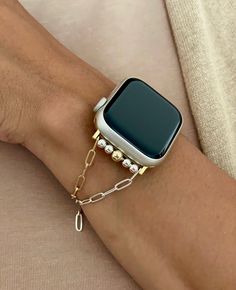 P R O D U C T ∙ D E S C R I P T I O N ∙ 14K Gold Filled & 925 Sterling Silver Paperclip Chain Bracelet For Apple Watch ∙ ∙ Adjustable Size Bracelet Perfectly Tailored for Your Wrist ∙ ∙ Designed And Handmade by Simeon D Jewelry Studio ∙ ∙ This Bracelet Fits ALL Apple Watch Series ∙ ∙ Please Measure Your Wrist Before Submitting Your Order ∙ ∙ Not For Other Models. Apple Watch Is NOT Included ∙ ∙ The Photos Are Taken on a Apple Watch Series 7 - 41mm ∙ Sterling silver is entirely hypoallergenic and Gold Apple Watch Band With Extender As Gift, Modern Gold Apple Watch Band For Everyday, Adjustable Yellow Gold Watch Bands For Gift, Gold Luxury Watch Bands For Everyday, Yellow Gold Watch Bands For Gifts, Luxury Gold Chain Link Watch Bands, Adjustable Gold Chain Watch Bands, Gold Chain Link Bracelet Strap Watch Bands, Gold Chain Watch Bands As Gift