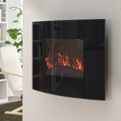 a wall mounted fire place in a living room