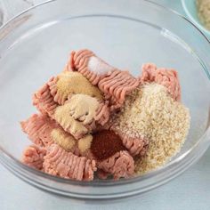 the ingredients for this dish include meat, spices and seasonings in a glass bowl