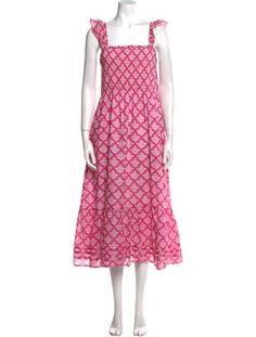 a mannequin wearing a pink dress with fish scales on the front and back