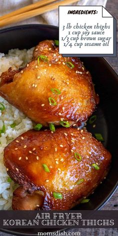 two pieces of chicken on top of rice in a bowl with chopsticks next to it