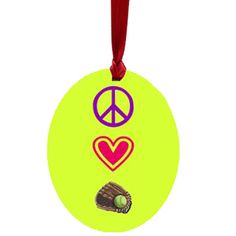 a green ornament with a peace sign and a heart