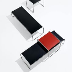 two tables with black and red sections on them