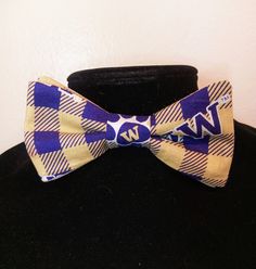 "This pre-tied and self-tie adjustable size bow tie is a perfect accent for any collared shirt! This bow tie can fit a child as young as three years old up to an adult with an 18\" neck size, even a dog or cat! *Finished print layout may vary from featured photo. **This is not a licensed product. Please note for UW, WSU, and Oregon bow ties- fabric prints have been updated as of May, 2020 The bow ties will be made with the new logo print fabrics featured in the photo next to the finished bow tie Adjustable Pre-tied Bow Tie, Adjustable Dapper Ties With Bow Tie Back, Pre-tied Bow Tie With Butterfly Knot As Gift, Pre-tied Butterfly Knot Bow Tie Gift, Adjustable Bow Tie Back Bow As Gift, Adjustable Butterfly Knot Tie, Adjustable Bow Tie For Dapper Style, Casual Adjustable Bow Tie, Adjustable Black Tie With Butterfly Knot