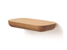 a wooden object on a white background