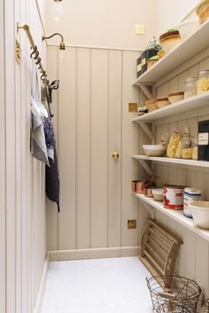 the pantry is clean and ready to be used as a storage area for various items