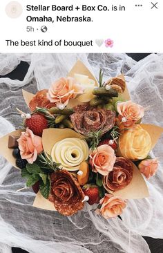 an image of a bouquet made out of flowers on the phone screen with text that reads, stellar board + box co is in