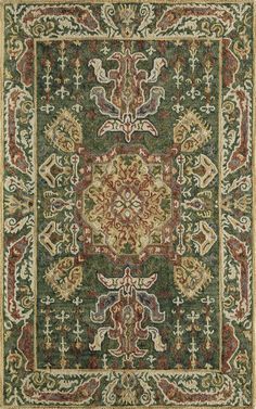 a green and red rug with an ornate design on the center, surrounded by smaller floral designs