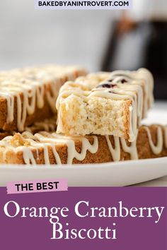 the best orange cranberry biscotti is on a white plate with text overlay