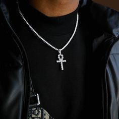 This iced out Gold Ankh is the perfect addition to your jewelry collection. This cross necklace’s design is inspired by the Egyptian Ankh, also called the Egyptian Cross. The Ankh denotes life, wisdom, and insight on the highest level. This Ankh Necklace is skillfully crafted to precision by professional jewelers. It boasts of expert craftsmanship and a timeless design that will add the perfect touch to your apparel. This Gold Ankh Cross Necklace is a must-have for all hip-hop jewelry collectors Streetwear Jewelry: Cross Pendant Chain, Streetwear Jewelry With Cross Pendant Chain, Streetwear Cross Pendant Chain Jewelry, Silver Cross Necklace For Streetwear, Egyptian Cross, Nail Cross, Dope Jewelry Accessories, Egyptian Ankh, Ankh Necklace