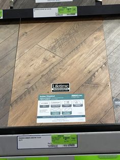 the flooring is being sold at costco in this photo, it looks like wood