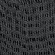 a black cloth textured with small squares and lines, as well as the background