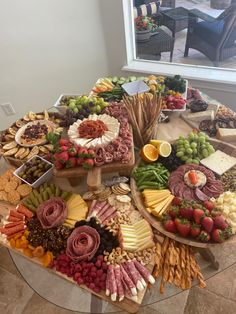 a table topped with lots of different types of food