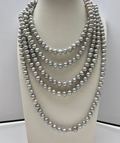 Material : Genuine Freshwater Pearl Length : 90 inch ready to wear necklaces Shape : Potato with Ring Bead Size: 7-8 mm Color : 2 Color Options :- - Natural White - Silver Gray Shipping : We ship all orders within 24 hours from the U.S. (We closed on Saturday and Sunday) ** We Offer CUSTOM MADE SERVICES and WHOLESALE DISCOUNTS on LARGE QUANTITY PURCHASE. Please convo us on your requirements. We will be happy to create a private listing for you** As the variations in materials, there might be sli Silver Bridal Necklace With Polished Round Beads, Silver Polished Beads Necklaces For Wedding, Silver Bridal Necklace With Round Beads, Silver Wedding Necklaces With Polished Beads, Classic Silver Bridal Necklace With Round Beads, Silver Pearl Bridal Necklace With Round Beads, Silver Beaded Long Necklace For Wedding, Silver Long Beaded Necklace For Wedding, Long Silver Beaded Necklace For Wedding