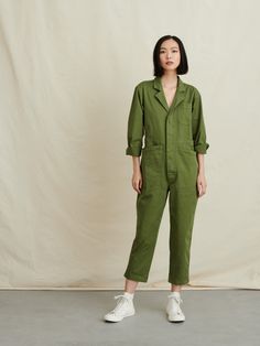 A vintage-inspired jumpsuit that gets the details just right. Note: The lapel neckline, a slightly cropped leg, slanted side pockets, and adjustable side tabs at the waist. With an optional rosette button-hole on the front pocket.Due to the nature of the garment dyeing process, slight variations in color should be expected. Jia is 5'10" and wearing a size SM.Refer to our size guide for specific measurements. 98% BCI cotton. 2% spandex. Utility Jumpsuit, Alex Mill, Long Sleeve Jumpsuit, Long Jumpsuits, The Nature, Chic Woman, Levis Jeans, New Outfits