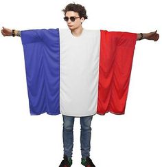 a man is holding two different colors of the french flag on his shoulders and arms