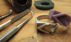 In this class you will carve a ring from wax, learn about sizing & design by applying all kinds of textures to your creation. This is a great 1st class on how to learn how to make jewelry. No prior jewelry-making experience necessary Experience provided in English (US) Workshop Includes: 2 Hour Class 7 grams of .925 silver is included in the class fee. For gold, & heavier sterling silver, the price will vary by weight to the metal You will learn about the lost wax casting process and how jewelry Ring Casting, Wax Carved Ring, Wax Jewelry, Wax Carving Jewelry, Carving Jewelry, Ring Style Guide, Unusual Wedding Rings, Cast Rings, Silver Smithing