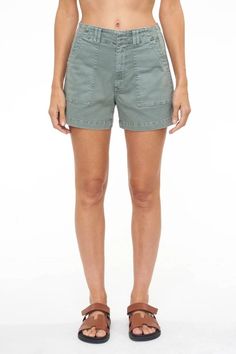 a person wearing shorts and heels Relaxed Fit Mid-rise Shorts With Patch Pockets, Mid-rise Relaxed Fit Shorts With Patch Pockets, High Rise Shorts With Patch Pockets For Spring, Spring Mid-rise Jean Shorts With Patch Pockets, Utility High-waisted Shorts With Patch Pockets, Summer Jean Shorts With Patch Pockets, Cotton Cargo Style Jean Shorts, Spring Cargo Style Utility Jean Shorts, Mid-rise Summer Shorts With Patch Pockets