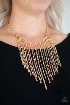 Varying in length, mismatched gold chains stream from the bottom of a classic gold chain. Faceted golden crystal-like beads sporadically dot the free-falling chains, creating a statement-making fringe below the collar. Features an adjustable clasp closure. Sold as one individual necklace. Includes one pair of matching earrings. Gold Fringe Necklace, Trendy Fringe, Golden Crystal, Hematite Crystal, Gold Fringe, Free Falling, 25 21, Fringe Necklace, Silver Chains