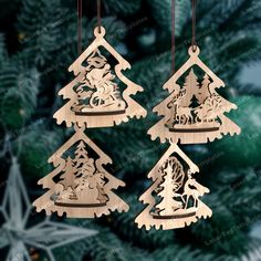 three wooden ornaments hanging from a christmas tree