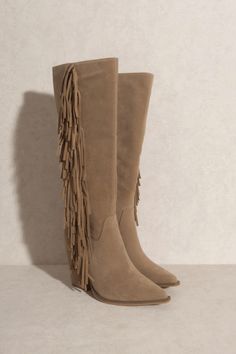 Oasis Society Out West Knee-High Fringe Boots Bohemian Suede Boots With Tassels, Western Boots With Tassels For Fall, Western Style Boots With Tassels For Fall, Bohemian Suede Winter Boots, Bohemian Winter Suede Boots, Brown Tasseled Boots For Festivals, Winter Suede Boots With Tassels, Brown Fringe Boots For Festival, Spring Bohemian Boots With Fringe