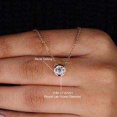 This stunning IGI-certified round lab grown solitaire diamond necklace will make a perfect gift for the special woman in your life. The bezel setting showcases the beautiful diamond, and the IGI certification guarantees that it is high quality and authentic. This diamond necklace will last a lifetime and make her feel special. "𝐓𝐨𝐠𝐞𝐭𝐡𝐞𝐫 𝐰𝐞 𝐜𝐚𝐧 𝐦𝐚𝐤𝐞 𝐭𝐡𝐞 𝐰𝐨𝐫𝐥𝐝 𝐚 𝐛𝐞𝐭𝐭𝐞𝐫 𝐩𝐥𝐚𝐜𝐞 𝐟𝐨𝐫 𝐥𝐢𝐯𝐢𝐧𝐠, 𝐥𝐞𝐭’𝐬 𝐠𝐨 𝐰𝐢𝐭𝐡 𝐦𝐢𝐧𝐢𝐧𝐠-𝐟𝐫𝐞𝐞 𝐝𝐢𝐚𝐦𝐨𝐧𝐝𝐬 𝐚? Solitaire Lab Grown Diamond Necklace, Anniversary Solitaire Necklace With Round Pendant, Moissanite Diamond Necklace With Bezel Setting, Anniversary Moissanite Solitaire Necklace With Round Pendant, Round Moissanite Solitaire Necklace For Anniversary, Anniversary Round Moissanite Solitaire Necklace, Diamond White Moissanite Solitaire Necklace With Bezel Setting, Anniversary Solitaire Necklace With Ethical Diamonds, Moissanite Solitaire Necklace With Bezel Setting