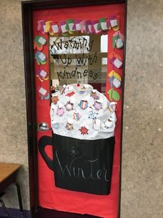 a door decorated to look like a coffee cup