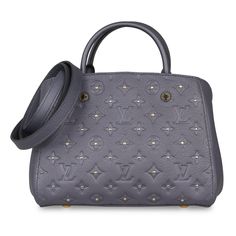 Crafted in grey monogram empreinte leather with stud detailing, the luxurious LV Montaigne BB handbag features dual leather rolled handles, hook closure opening and open compartments perfect for fitting in everyday essentials. The detachable strap allows for the bag to be longer on the body for added versatility. Named after the famous Parisian location, it is sophisticated and sturdy. A timeless design perfect for the modern woman. SPL Exterior Slate grey/purple monogram empreinte leather Stud Lv Montaigne, Studs Gold, Leather Roll, Timeless Handbag, Slate Grey, Luxe Fashion, Exclusive Bag, Everyday Essentials, New Bag