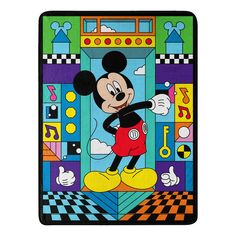 the mickey mouse is standing in front of a colorful background